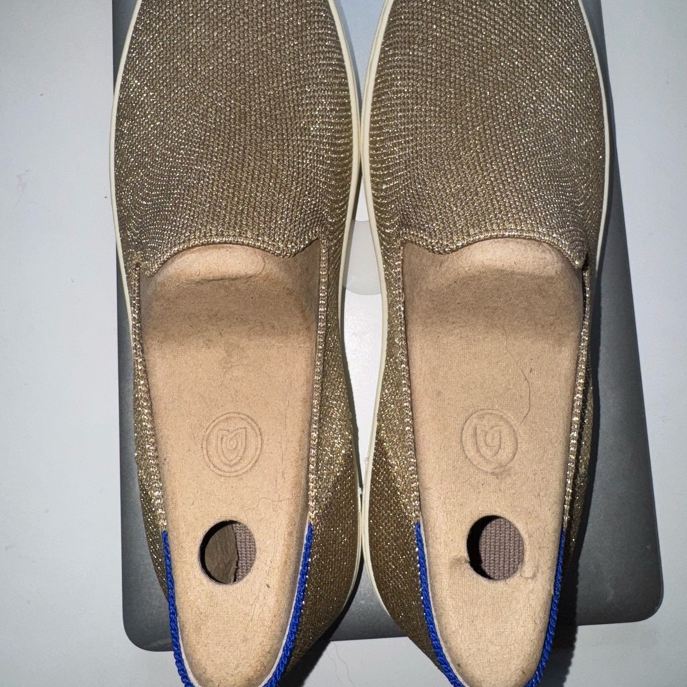 Rothy’s gold slip ons